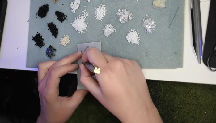 Cut and shape the felt base for the spider's body.