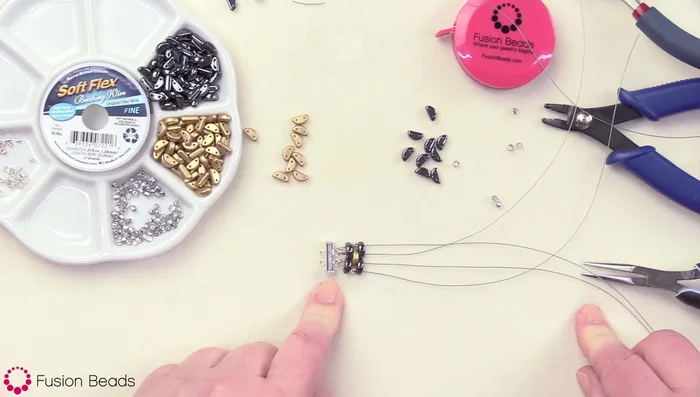 String beads until the desired bracelet length (approximately 7 3/4 inches of beadwork, plus clasp) is reached.