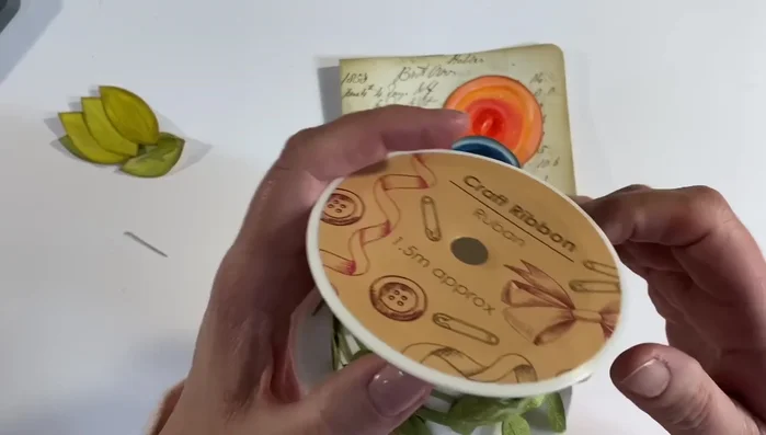 Cut and add craft ribbon as stems for the flowers.