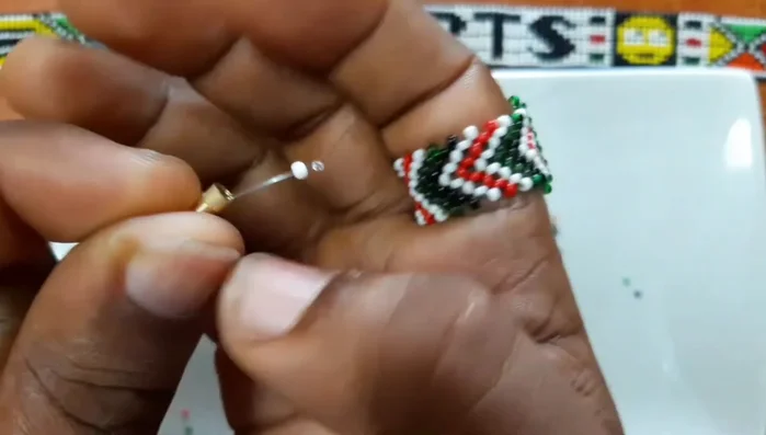 Attach one end of the lock to the fishing line.