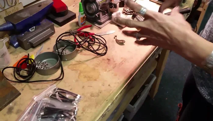 Glue the double end cap: Apply a small drop of Gorilla Super Glue Gel to each side of the double end cap and insert the leather cords. Wiggle the cords to spread the glue.