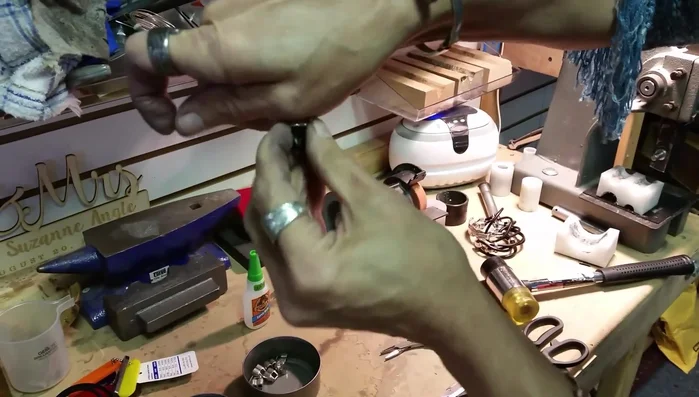 Wear the bracelet: Slide the leather cord through the slider, hook it onto the other end of the silverware, and push the slider back up.