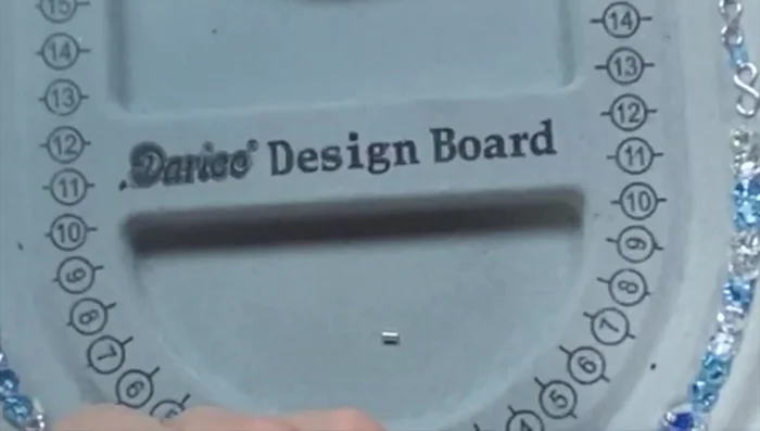 String beads onto wire: Thread a crimp bead onto the bead wire, leaving a tail. String the prepared beads onto the wire, ensuring they lay snugly together. Alternating colors and sizes as planned.