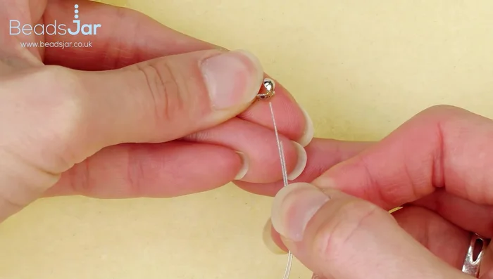 Repeat steps 4 and 5 for the other end of the bracelet.