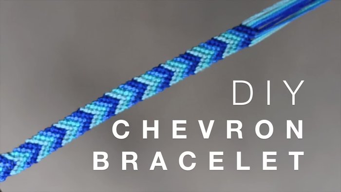 Prepare the embroidery floss: Cut several strands (4 in this example), fold them in half, and create a loop at the top by knotting them together.