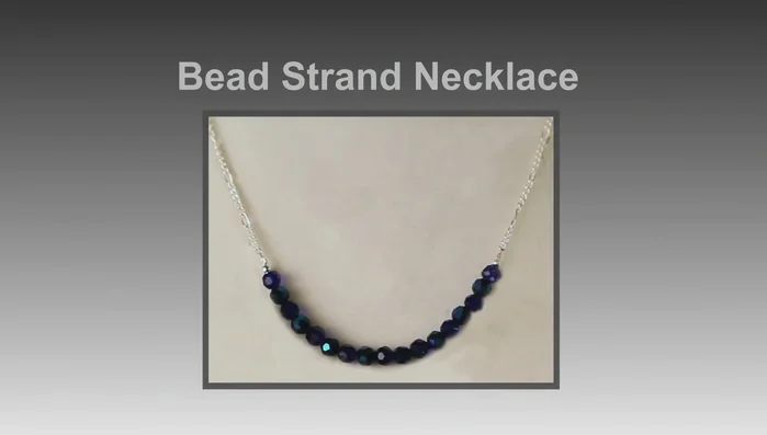 Turn the crimp tube 90° and fold it in half. Trim the wire and repeat on the other side.