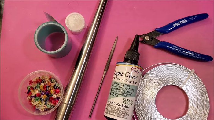 Join two tape ring halves together, securing with a small piece of tape.