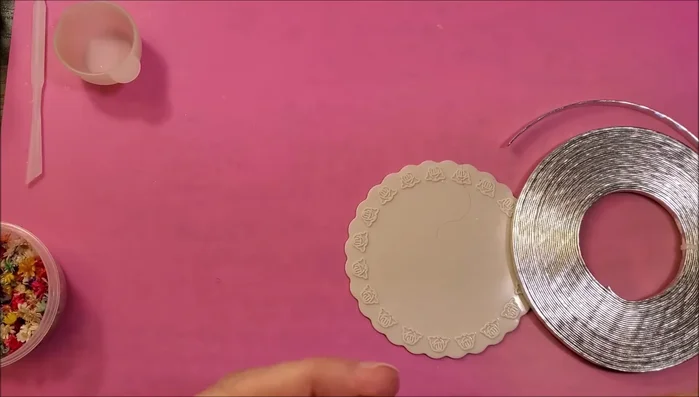 Join two tape ring halves together, securing with a small piece of tape.