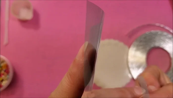 Join two tape ring halves together, securing with a small piece of tape.