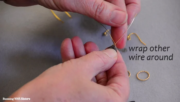 Cut the excess wire and use chain nose pliers to tighten the wraps.