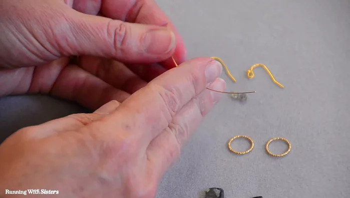 Cut the excess wire and use chain nose pliers to tighten the wraps.