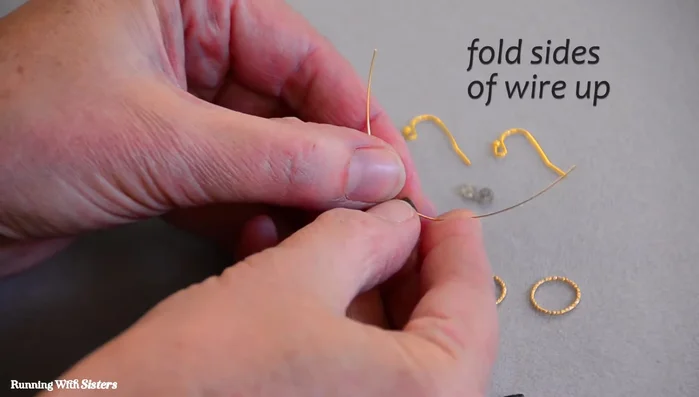 Cut the excess wire and use chain nose pliers to tighten the wraps.