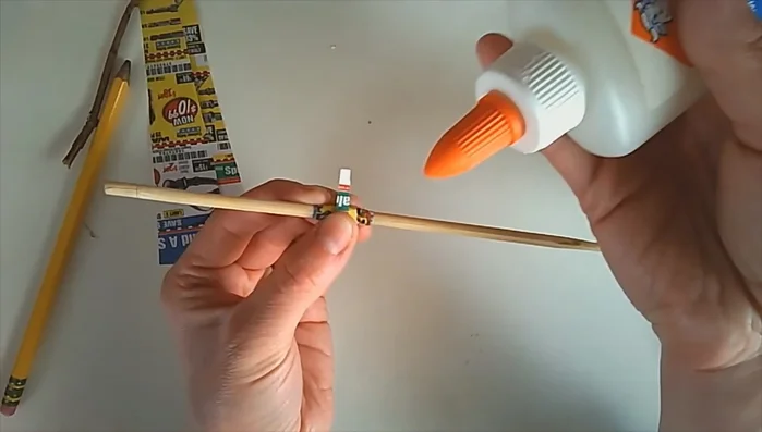 Let the glue or tape dry.