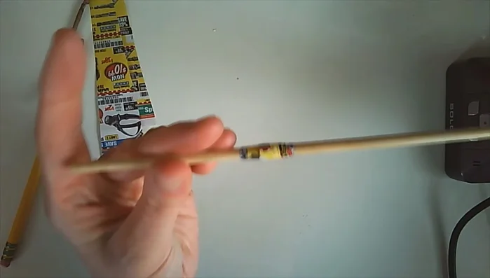 Let the glue or tape dry.