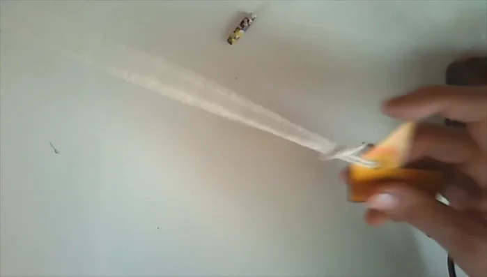 Tie the necklace around your power symbol.