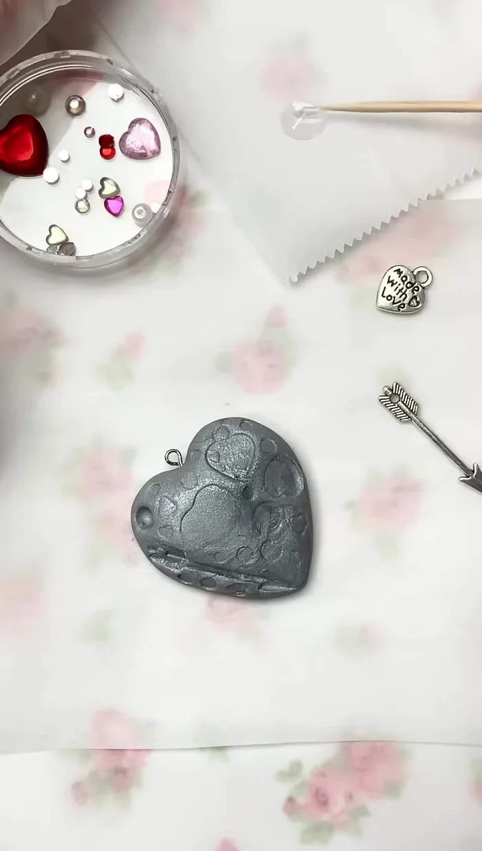 After cooling, use UV resin to reattach the embellishments and cure under a UV lamp.