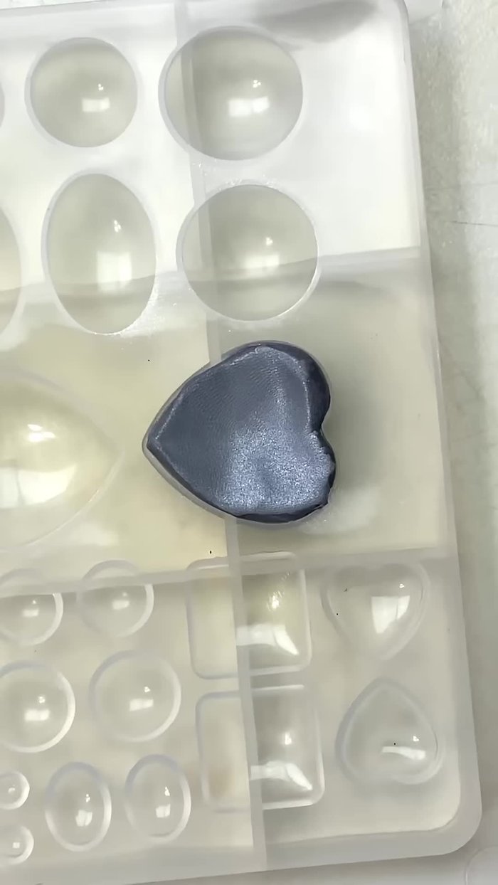 Trace a heart shape onto scrap paper to plan the design.