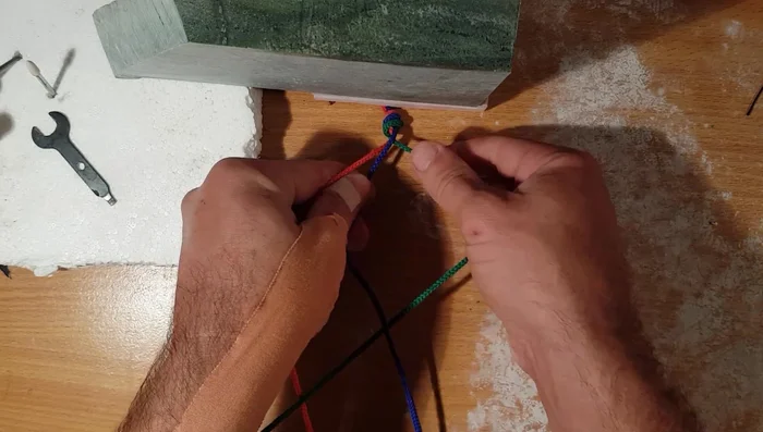 To finish, tie off the ends with a secure knot.