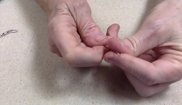 Prepare your wire: Cut approximately 8 inches of wire and fold it in half.