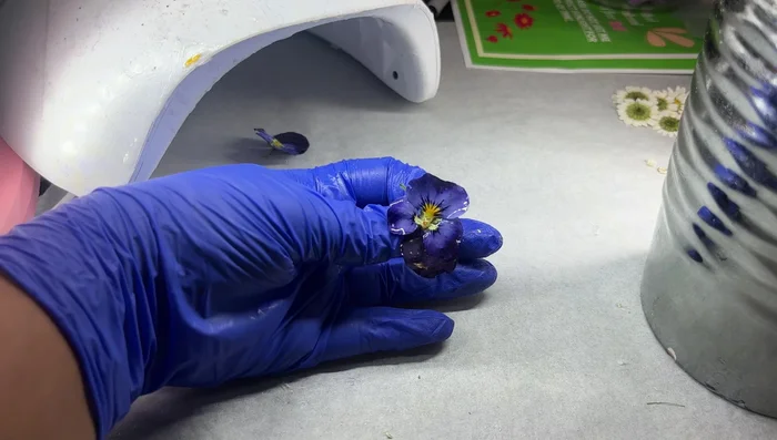 Repeat resin application on the back of the flower.