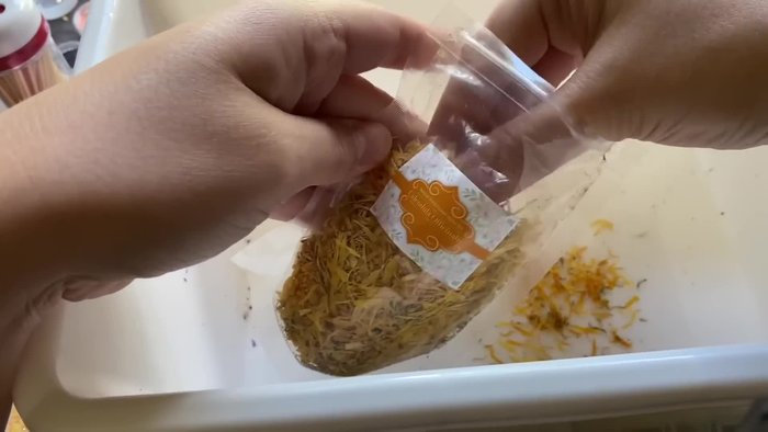 Crumble dried flowers. Tear petals off, discarding stems. Smaller and varied sizes add interest.