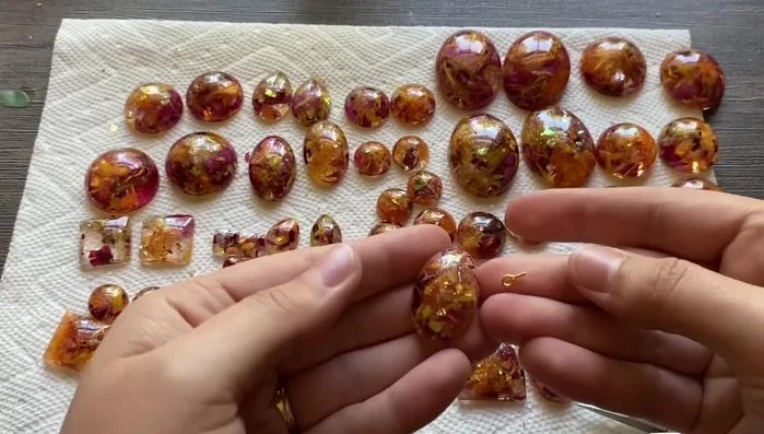 Turn the earring hooks if needed for correct alignment.