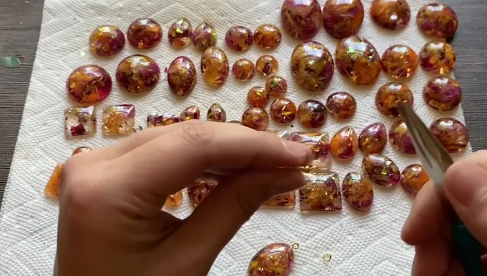 Turn the earring hooks if needed for correct alignment.