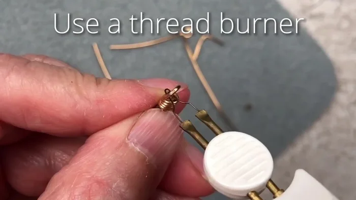 Lightly burn the cut leather ends to prevent fraying.