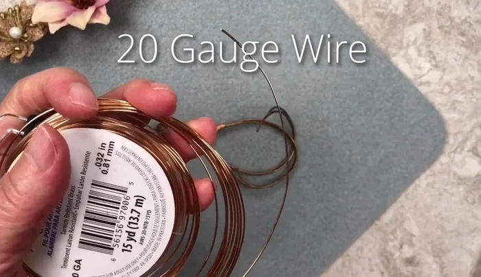Repeat steps 2 and 3 for the second wire piece, ensuring both loops are identical.