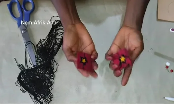 Wrap the strawboard shapes tightly with Ankara fabric and let the glue dry.