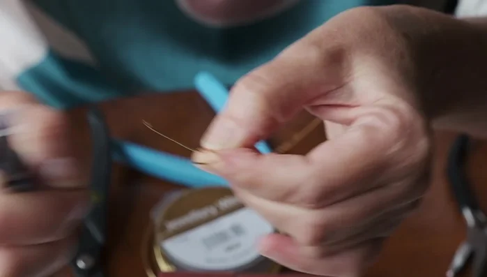 Straighten all four edges and the twisted part using nylon jaw pliers.