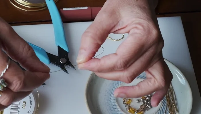 Trim and tuck in the excess wire ends.