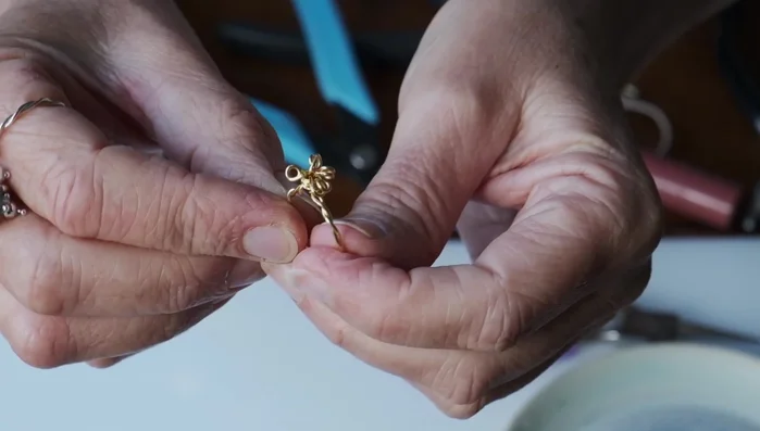 Open the loops slightly to prepare for beading.