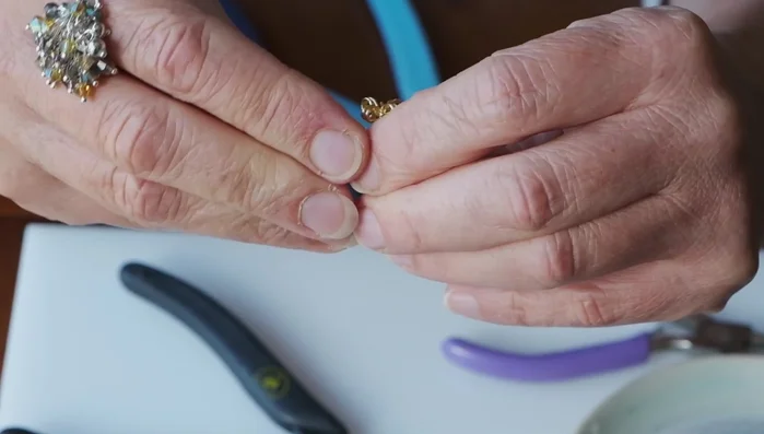 Open the loops slightly to prepare for beading.