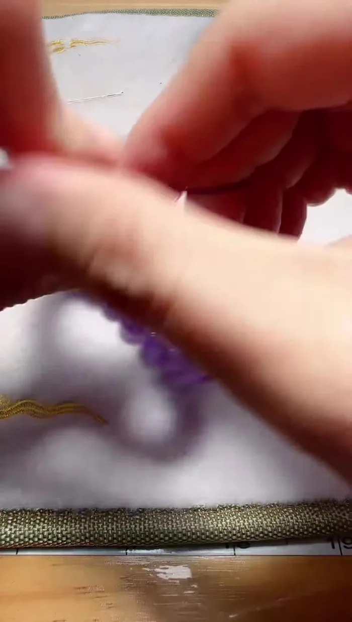 Hide the knot in the hole of the bracelet.