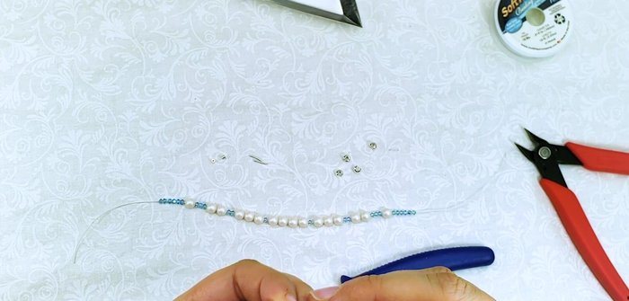 Repeat clasp attachment on the other side: Repeat steps 3 and 4 for the other end of the bracelet.