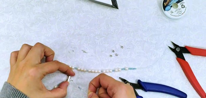 Prepare materials: Gather all the necessary beads, findings, and tools.