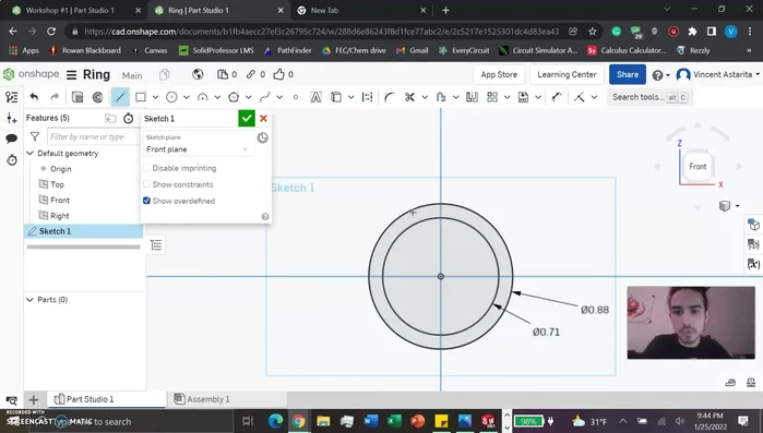 Create a second sketch on the front plane for the engraving area. Use the line tool to draw a rectangle within the outer circle. Use constraints (equal dimensions) to ensure the rectangle is centered and has the desired dimensions (e.g., 0.49 inches wide, 0.33 inches tall).