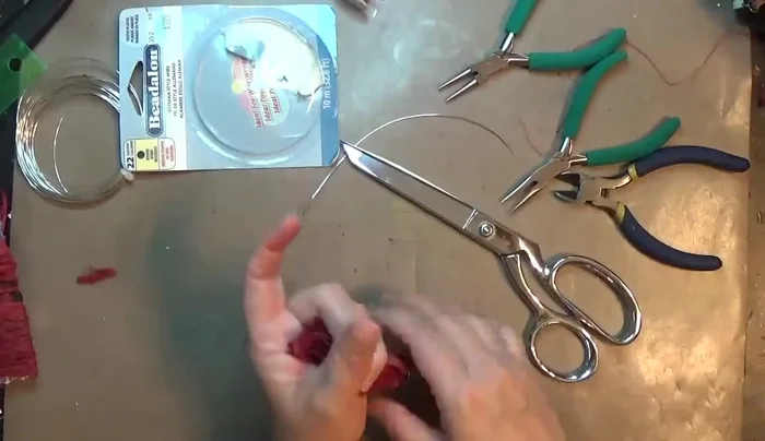 Trim the silk tassels to even out the length.