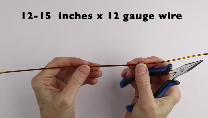 Finish the simple ring: Separate the ends slightly, use the cone again to wrap the wire, cut flush and adjust ends carefully to lie flat.