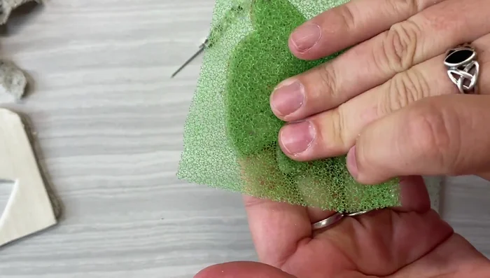 Finish shaping and texturing the backing, ensuring smooth edges and good contact.