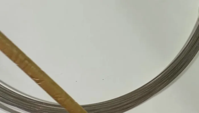 Make approximately 12 jump rings using 16 gauge wire and a 6mm dowel.