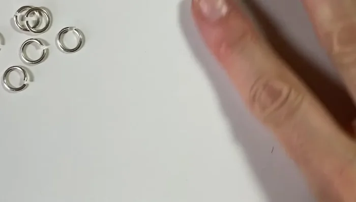 Make approximately 12 figure eight links using 18 gauge wire.