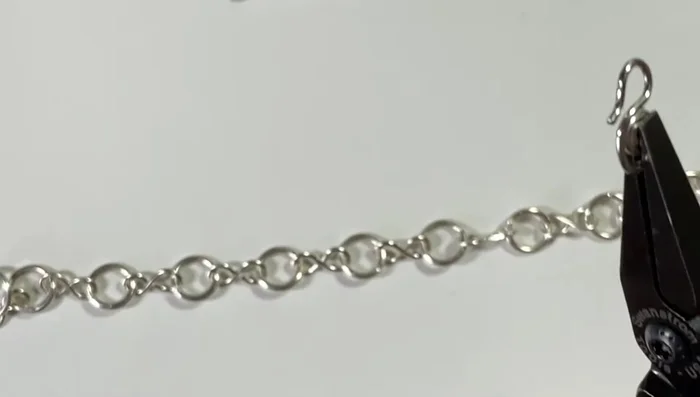 Add a clasp (e.g., swan clasp).