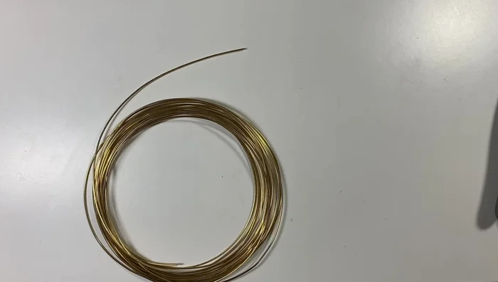 Create small loops at both ends of each link using round nose pliers. Keep loops small and facing the same direction.