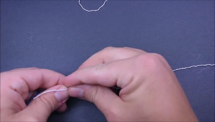 Trim and seal the ends: Cut the ends of the accent cord close to the bracelet and seal them with heat.
