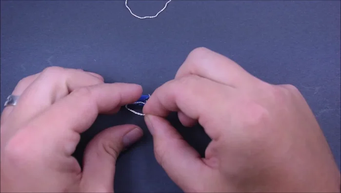 Trim and seal the ends: Cut the ends of the accent cord close to the bracelet and seal them with heat.