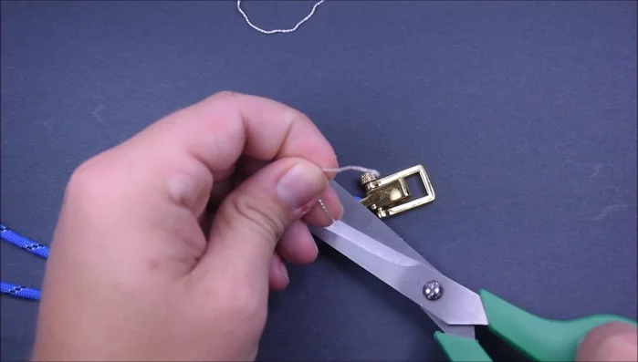 Trim and seal the ends: Cut the ends of the accent cord close to the bracelet and seal them with heat.