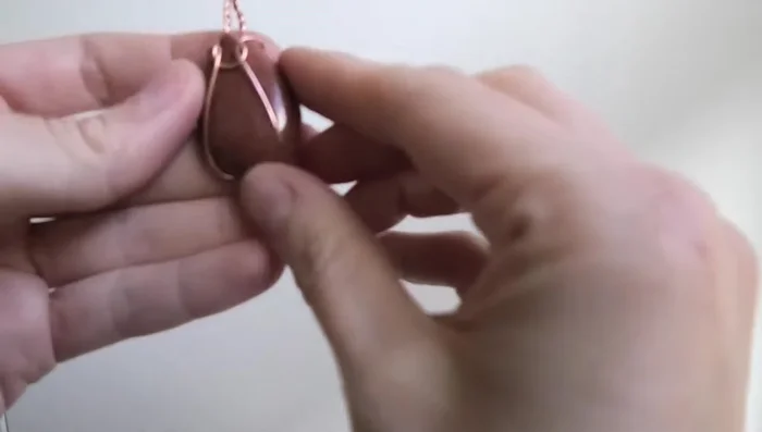 Adjust the bail to ensure it is even and secure.