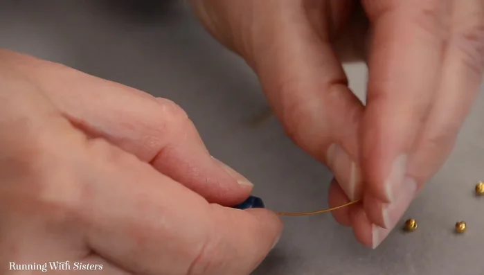 Repeat step 2 in reverse order (daisy spacer, round bead).